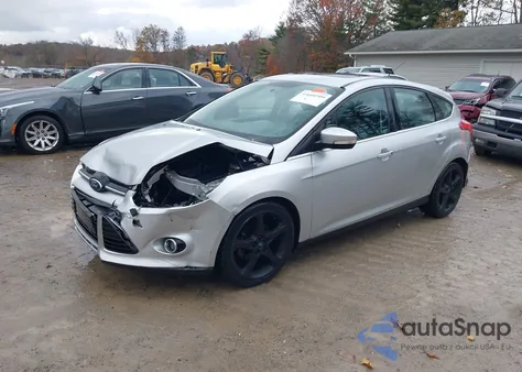 2013 Ford Focus Titanium z USA, uszkodzony, nr VIN 1FADP3N27DL380103